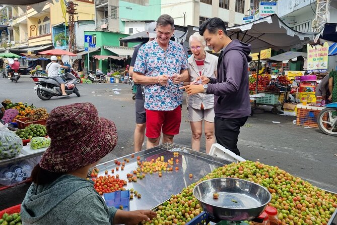 Saigon Private/Small Group Walking Food Tour with 13 Tastings - Ho Thi Ky Flower Market: snack heaven with sugarcane juice