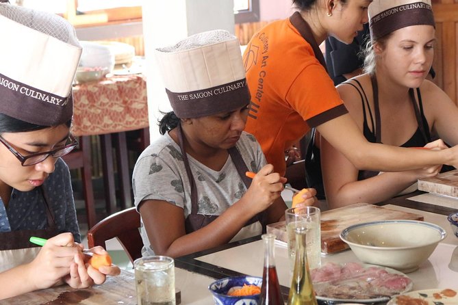 Small-group Cooking Class with Market visiting (4-5 hours) - Cyclo Pickup in District 1, and the Real Meaning of Convenience