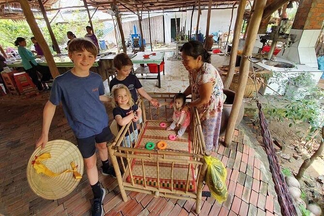 SMALL GROUP - Mekong Delta 1 Day Tour with Lunch - Getting out of the city: Vinh Trang Pagoda and the river first