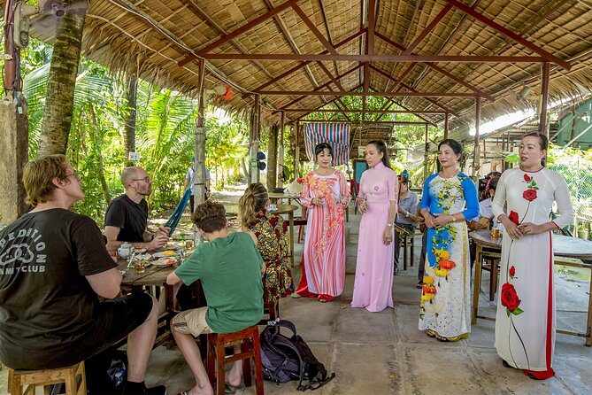 Small-Group Mekong Delta Day Trip: Boat Ride, Cottages & Pagoda - Lunch at the riverside: 5 courses, drinks, and traditional music