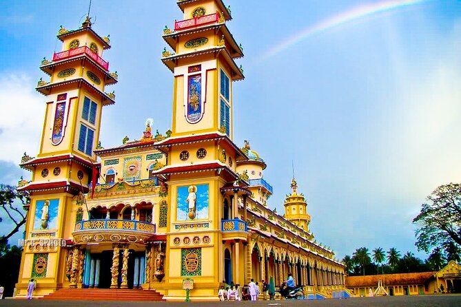 Tay Ninh Holy See - Cable Car & Cu Chi Tunnels | Small Group Tour - Inside the Cao Dai Holy See: holy eye, dragons, and midday mass