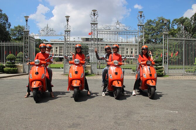 The Insider's Saigon With Female Ao Dai Riders Vespa 4,5 Hours - Riding past the Thu Thien Tunnel and finding the best photo moment