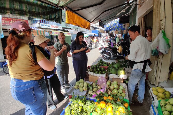 Three Coolest Neighborhoods in Saigon - Stop 2, Chợ Lớn Chinatown in Quận 5: Aquarium Street, Herbal Medicine Street, and temple colors