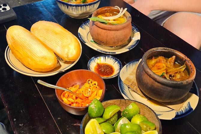 Unique Taste of Saigon Street Food Tour - Stop 1: a full spread of Saigon classics you can taste fast