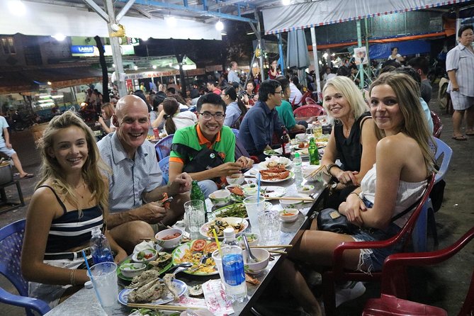 Vespa Saigon By Night Street Food Tour - The first dinner stop: banh xeo and spring rolls, served like locals