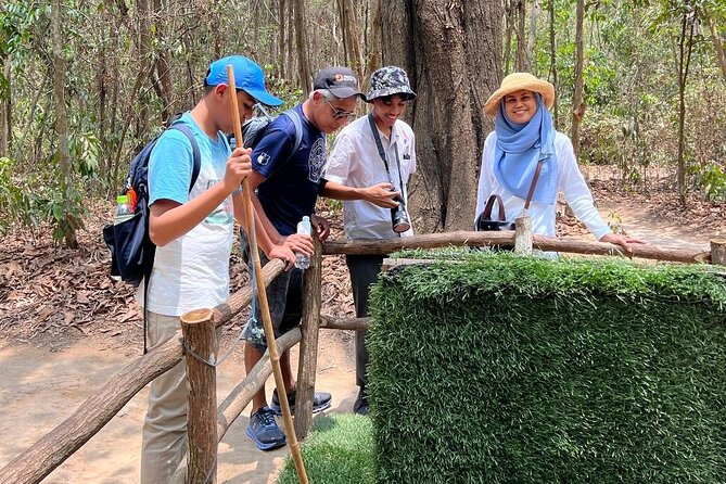 VIP Tour: Cu Chi Tunnels Half Day | Option: Real Shooting Guns - Tunnel-area focus: camouflage, shoes, and survival tricks