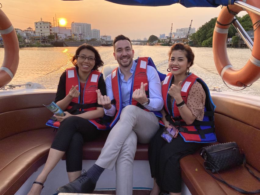 VIP Tour Enjoy Romantic Sunset by Speed Boat Free Cocktail - The Saigon River speedboat ride: bridges, Vinhomes, and port views